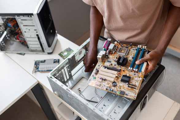 Desktop repair technician servicing a computer in Dubai