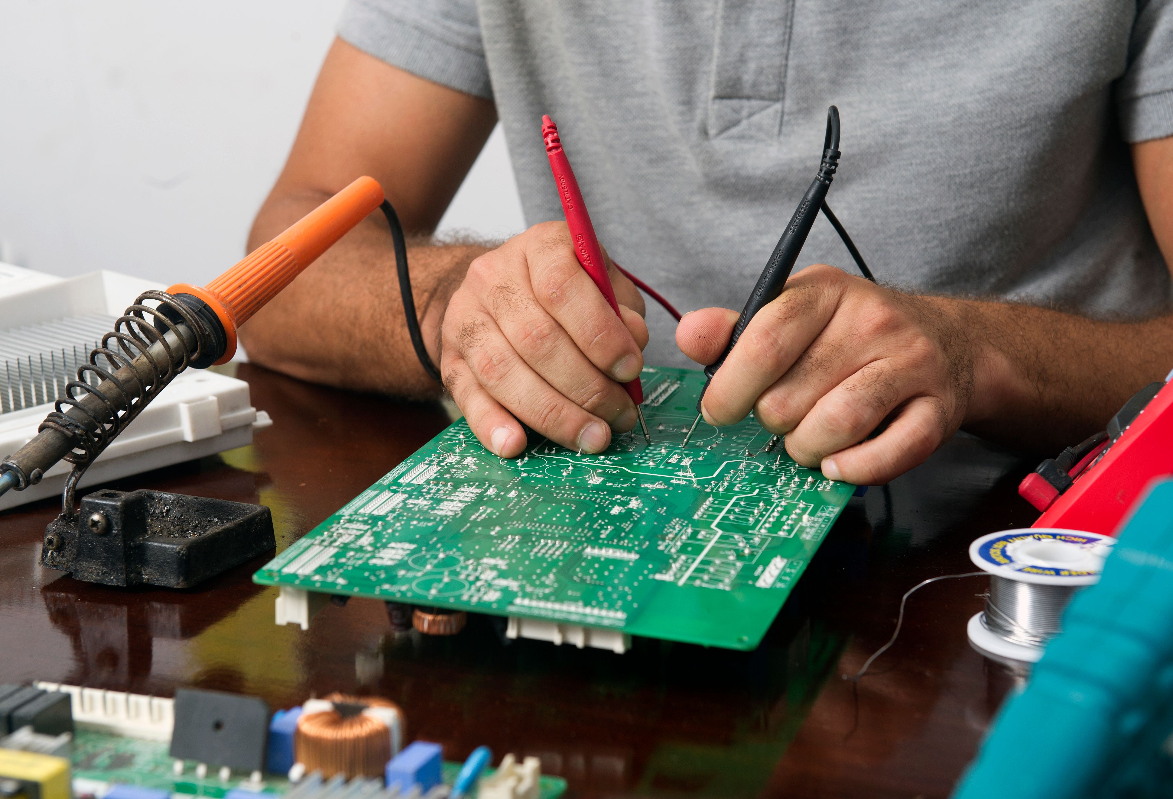 Electronics repair near Dubai - PCB and TV repair service technician